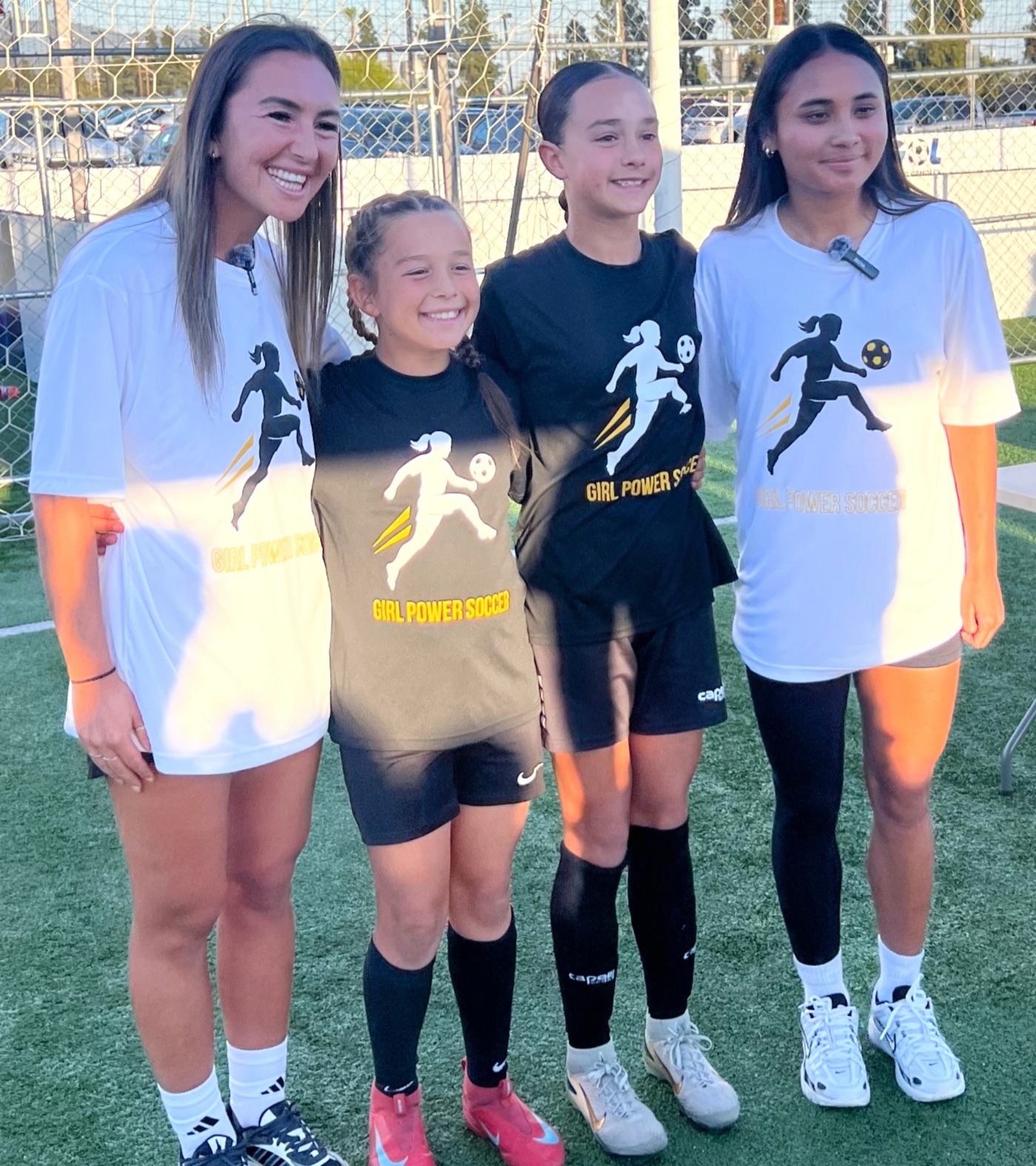 Young campers with pro players at a Soccer Skills Camp
