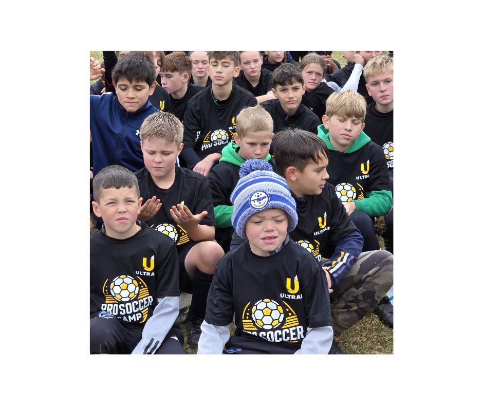 Young campers in Pro Soccer Camp shirts